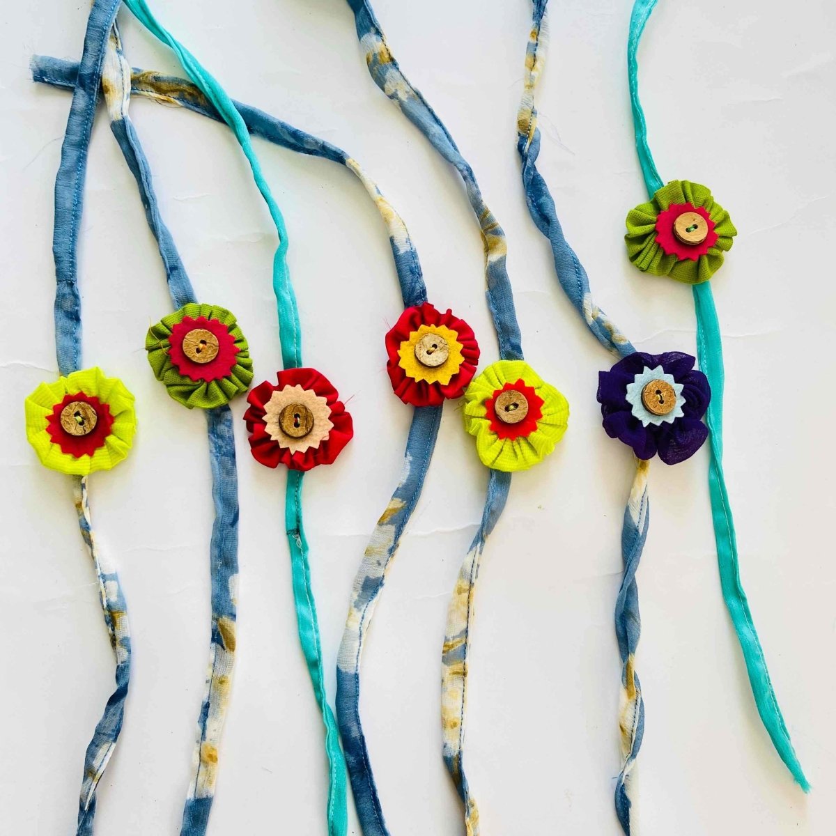 Handmade Rakhi-Green and Red with Coconut buttons