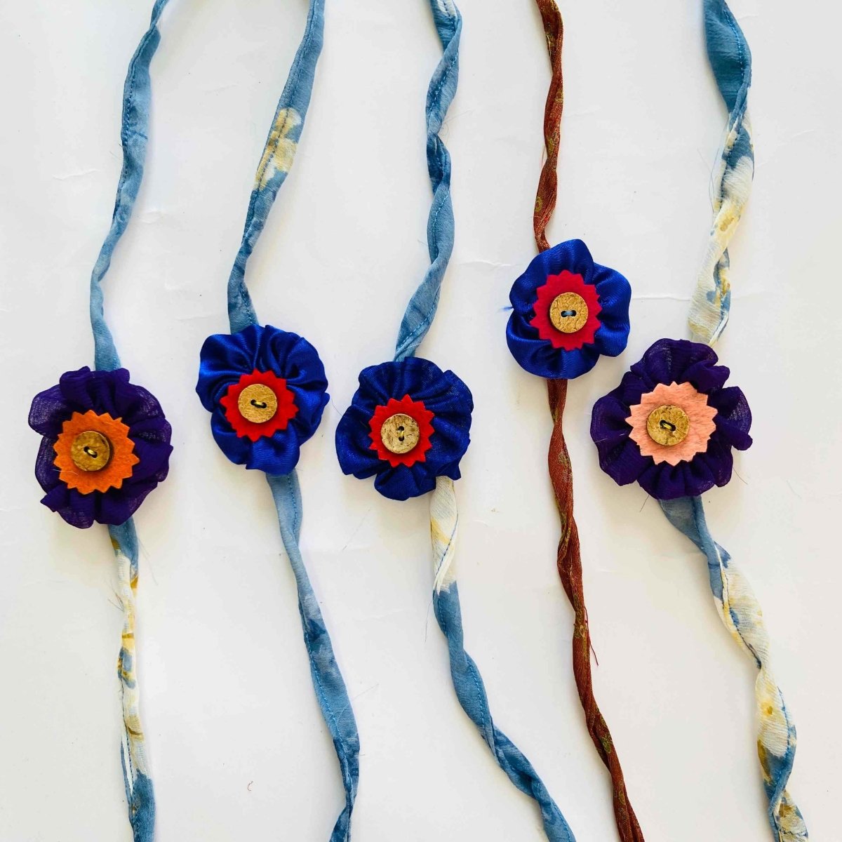 Handmade Rakhis - All Blue with Coconut buttons