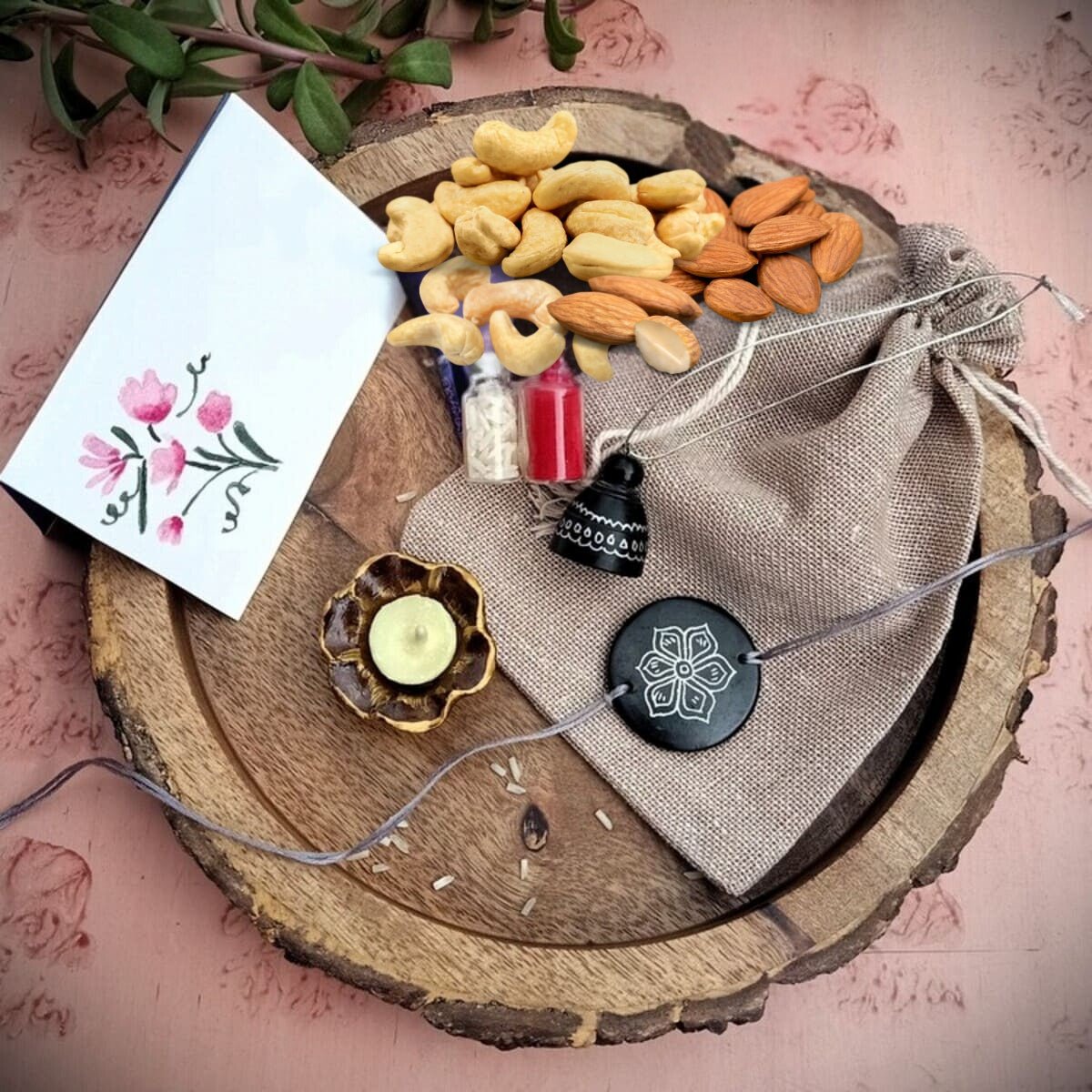 Nizamabad Black Pottery Bhaiya-Bhabhi Rakhi Festive Hamper