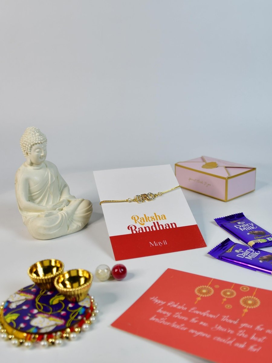 Sowpeace Exquisite BRO Rakhi Pack of 1 with Roli Chawal Thali, Chocolates, Buddha and Greeting card combo for Raksha Bandhan and Gifting