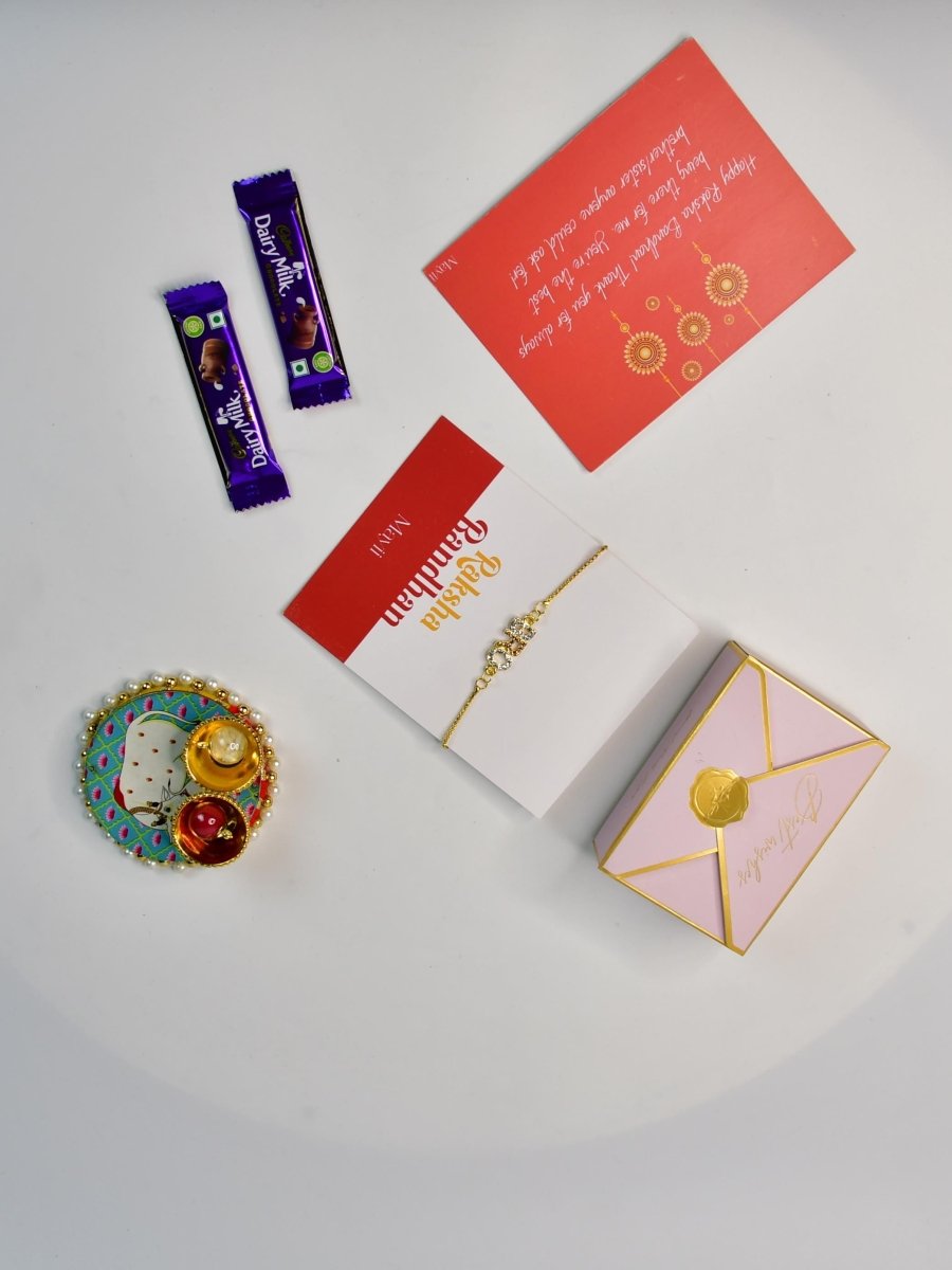 Sowpeace Exquisite BRO Rakhi Pack of 1 with Roli Chawal Thali, two Chocolates, and Greeting card combo for Raksha Bandhan and Gifting