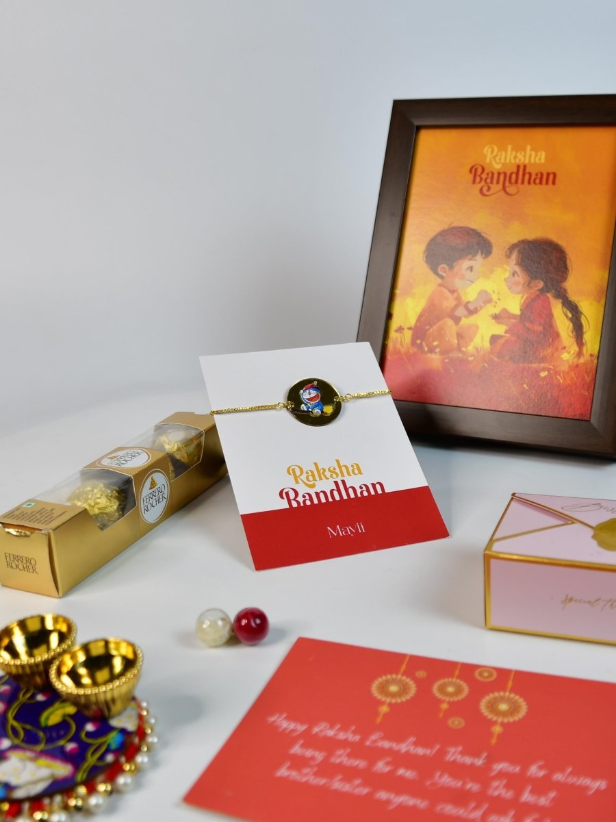 Sowpeace Exquisite Doraemon Rakhi Pack of 1 with Roli Chawal Thali, Chocolates, Photo Frame and Greeting card combo for Raksha Bandhan and Gifting