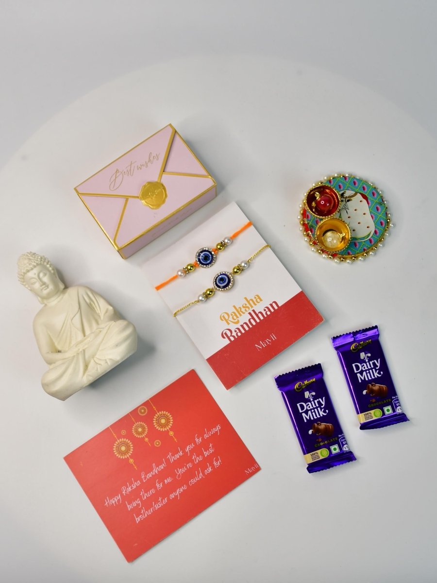 Sowpeace Exquisite Evil Eye Rakhi Pack of 1 with Roli Chawal Thali, Chocolates, Buddha and Greeting card combo for Raksha Bandhan and Gifting