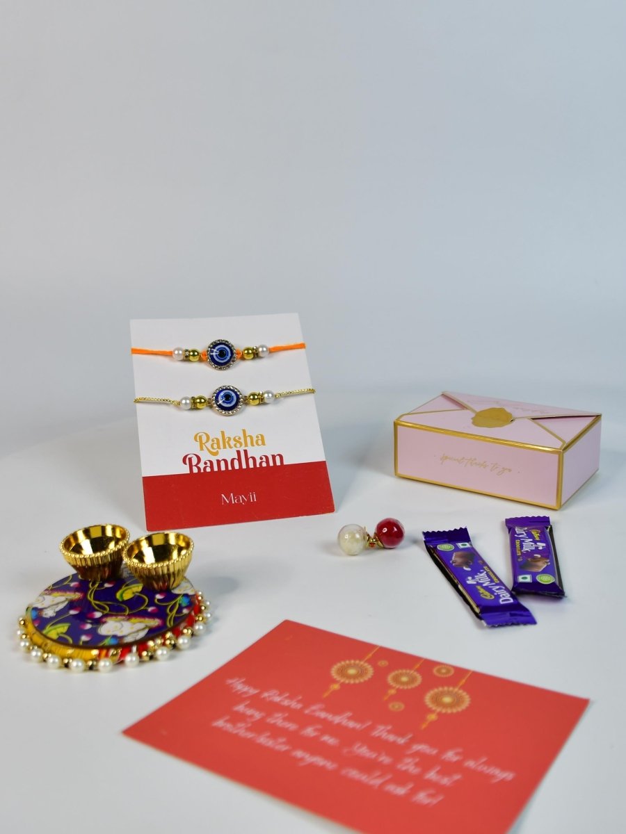 Sowpeace Exquisite Evil Eye Rakhi Pack of 1 with Roli Chawal Thali, two Chocolates, and Greeting card combo for Raksha Bandhan and Gifting