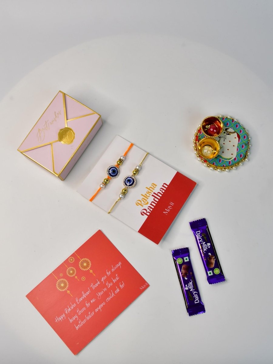 Sowpeace Exquisite Evil Eye Rakhi Pack of 1 with Roli Chawal Thali, two Chocolates, and Greeting card combo for Raksha Bandhan and Gifting