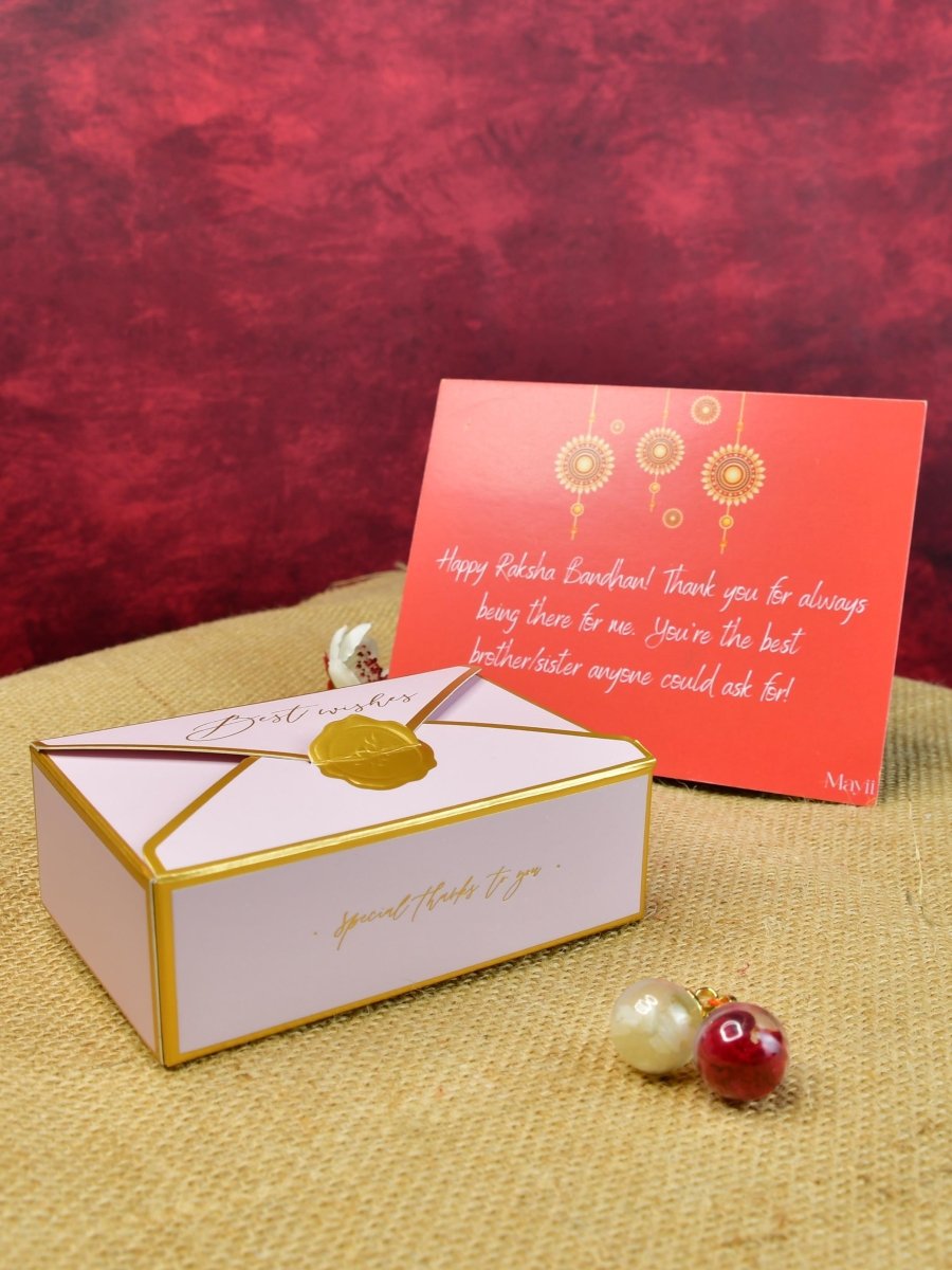 Sowpeace Exquisite Golden Ganesha Rakhi Pack of 1 with Roli Chawal Thali, Chocolates, and Greeting card combo for Raksha Bandhan and Gifting