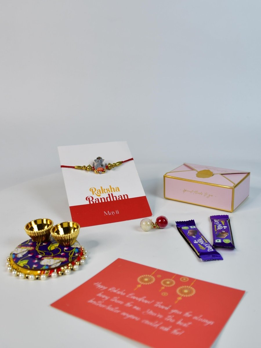 Sowpeace Exquisite Green Ganesha Rakhi Pack of 1 with Roli Chawal Thali, two Chocolates, and Greeting card combo for Raksha Bandhan and Gifting