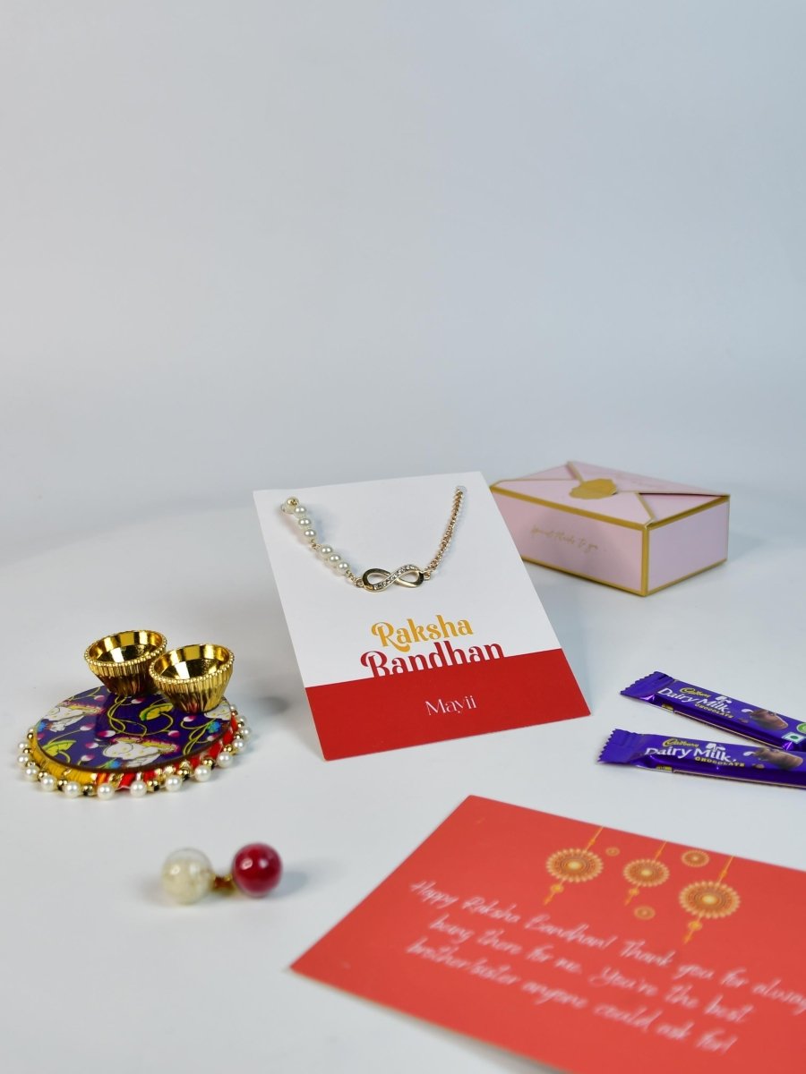 Sowpeace Exquisite Infinite Rakhi Pack of 1 with Roli Chawal Thali, Chocolates, and Greeting card combo for Raksha Bandhan and Gifting