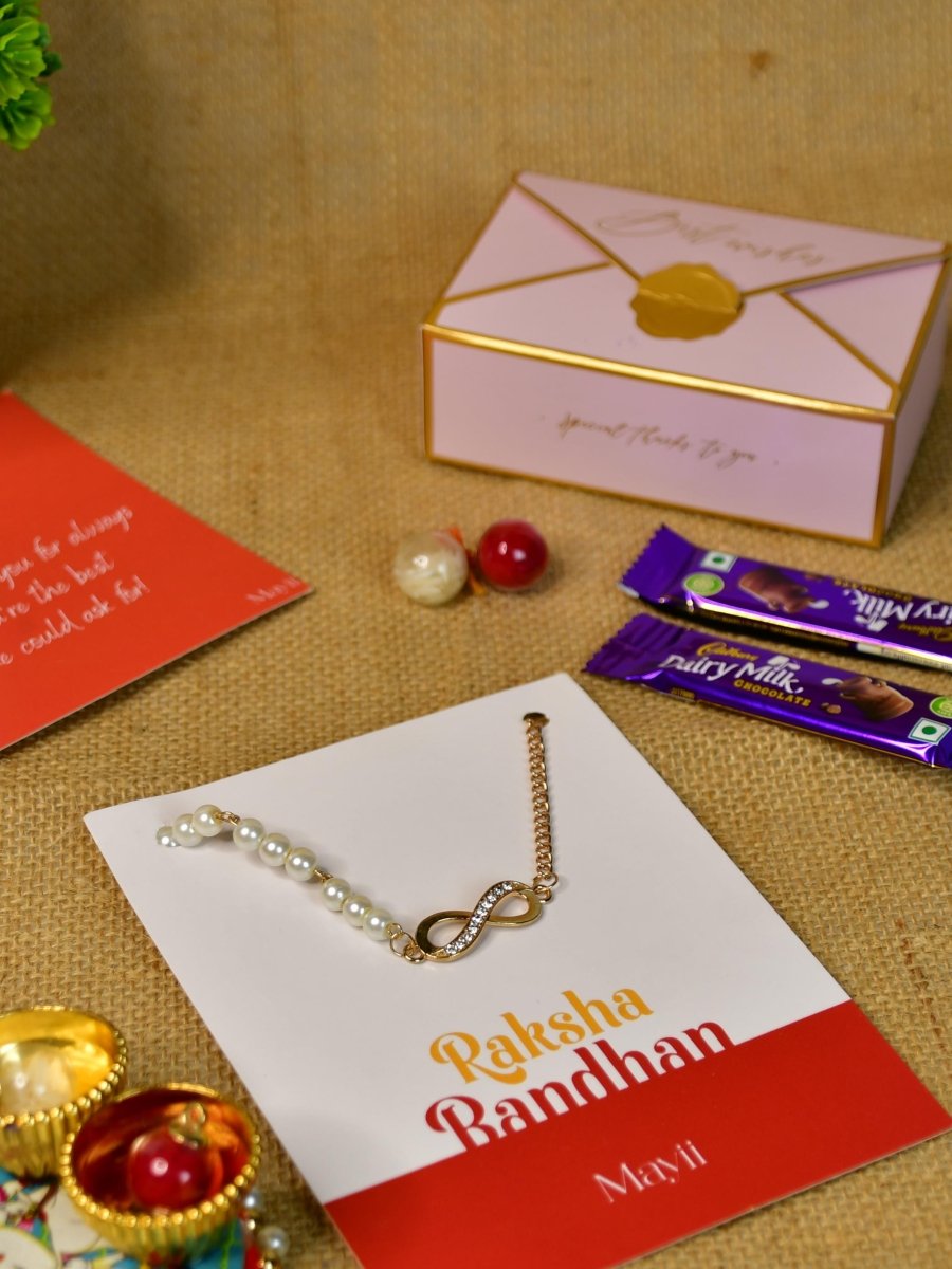 Sowpeace Exquisite Infinite Rakhi Pack of 1 with Roli Chawal Thali, two Chocolates, and Greeting card combo for Raksha Bandhan and Gifting