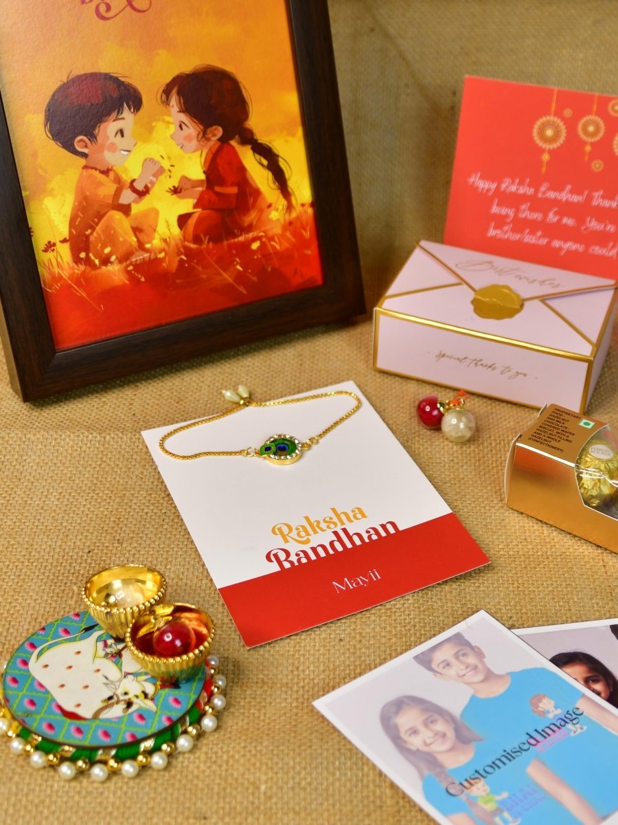 Sowpeace Exquisite Peacock Rakhi Pack of 1 with Roli Chawal Thali, Chocolates, Photo Frame, Poloroids and Greeting card combo for Raksha Bandhan and Gifting