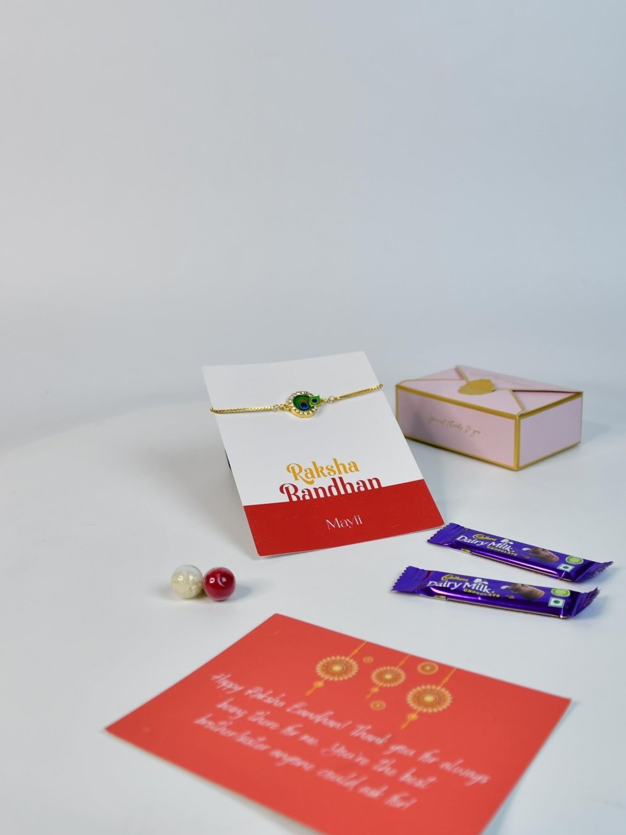 Sowpeace Exquisite Peacock Rakhi Pack of 1 with Roli Chawal Thali, two Chocolates, and Greeting card combo for Raksha Bandhan and Gifting