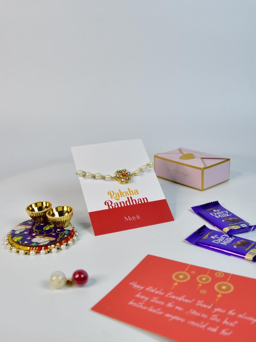 Sowpeace Exquisite Pearl Rakhi Pack of 1 with Roli Chawal Thali, Chocolates, and Greeting card combo for Raksha Bandhan and Gifting