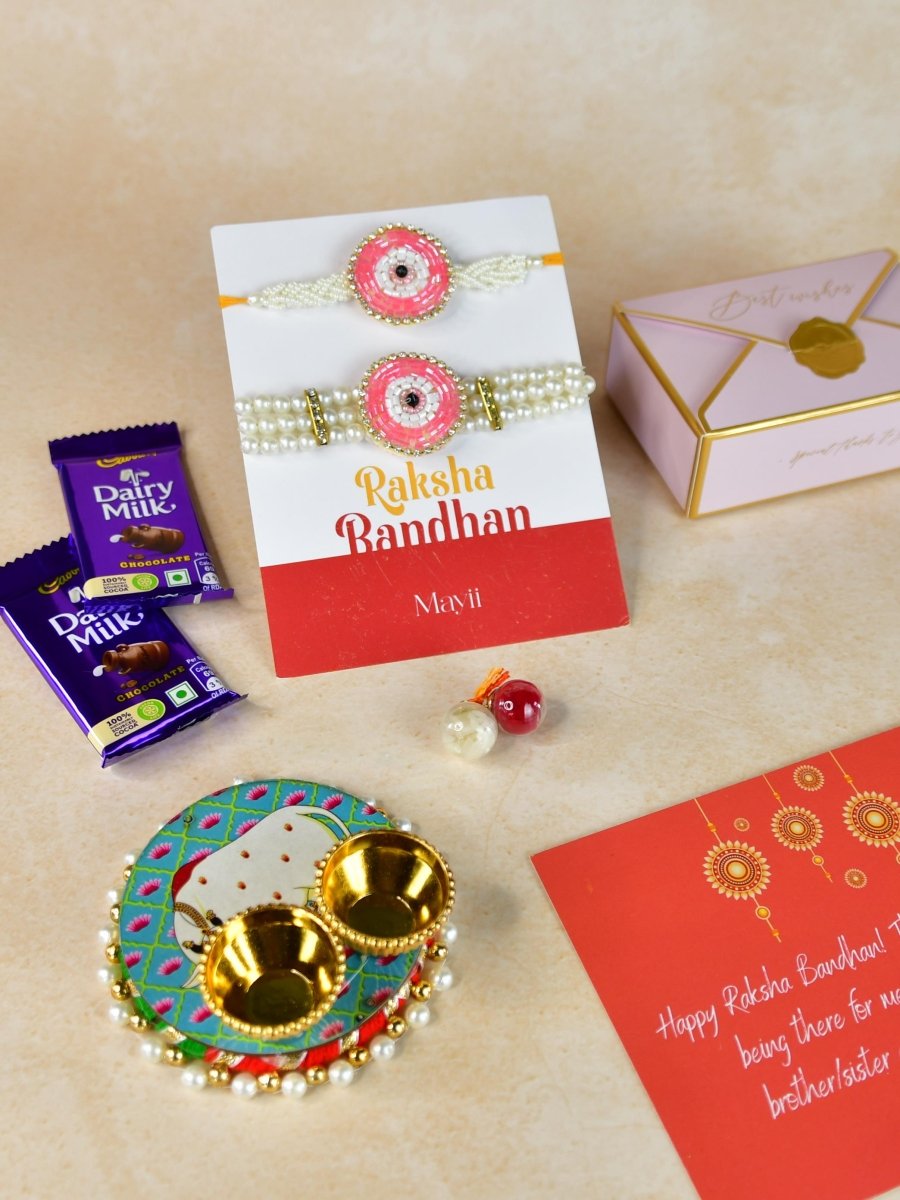 Sowpeace Exquisite Pink Circle Rakhi Pack of 1 with Roli Chawal Thali, Chocolates, and Greeting card combo for Raksha Bandhan and Gifting