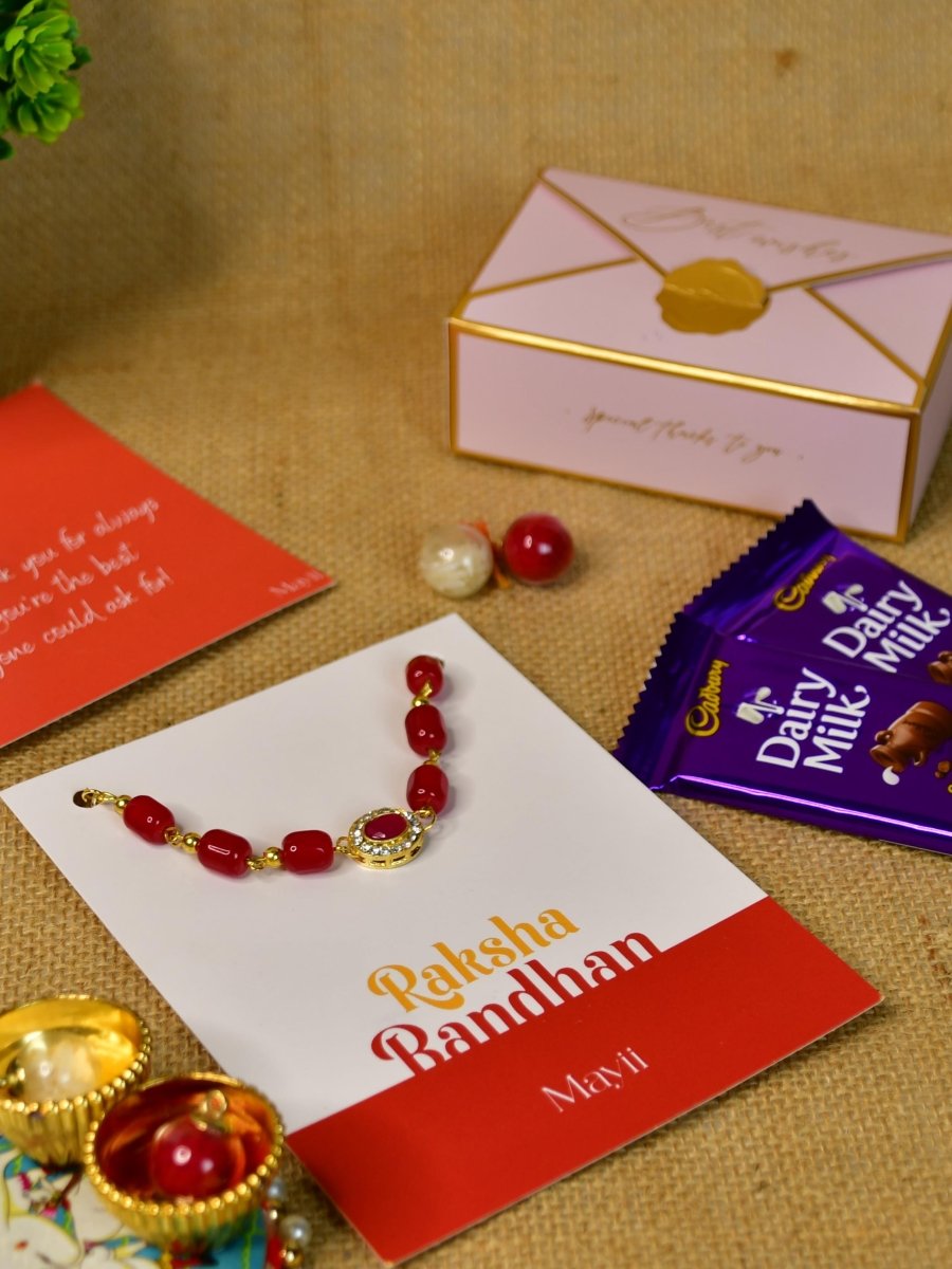 Sowpeace Exquisite Red Beads Rakhi Pack of 1 with Roli Chawal Thali, Chocolates, and Greeting card combo for Raksha Bandhan and Gifting