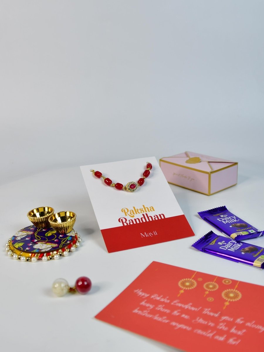 Sowpeace Exquisite Red Beads Rakhi Pack of 1 with Roli Chawal Thali, Chocolates, and Greeting card combo for Raksha Bandhan and Gifting