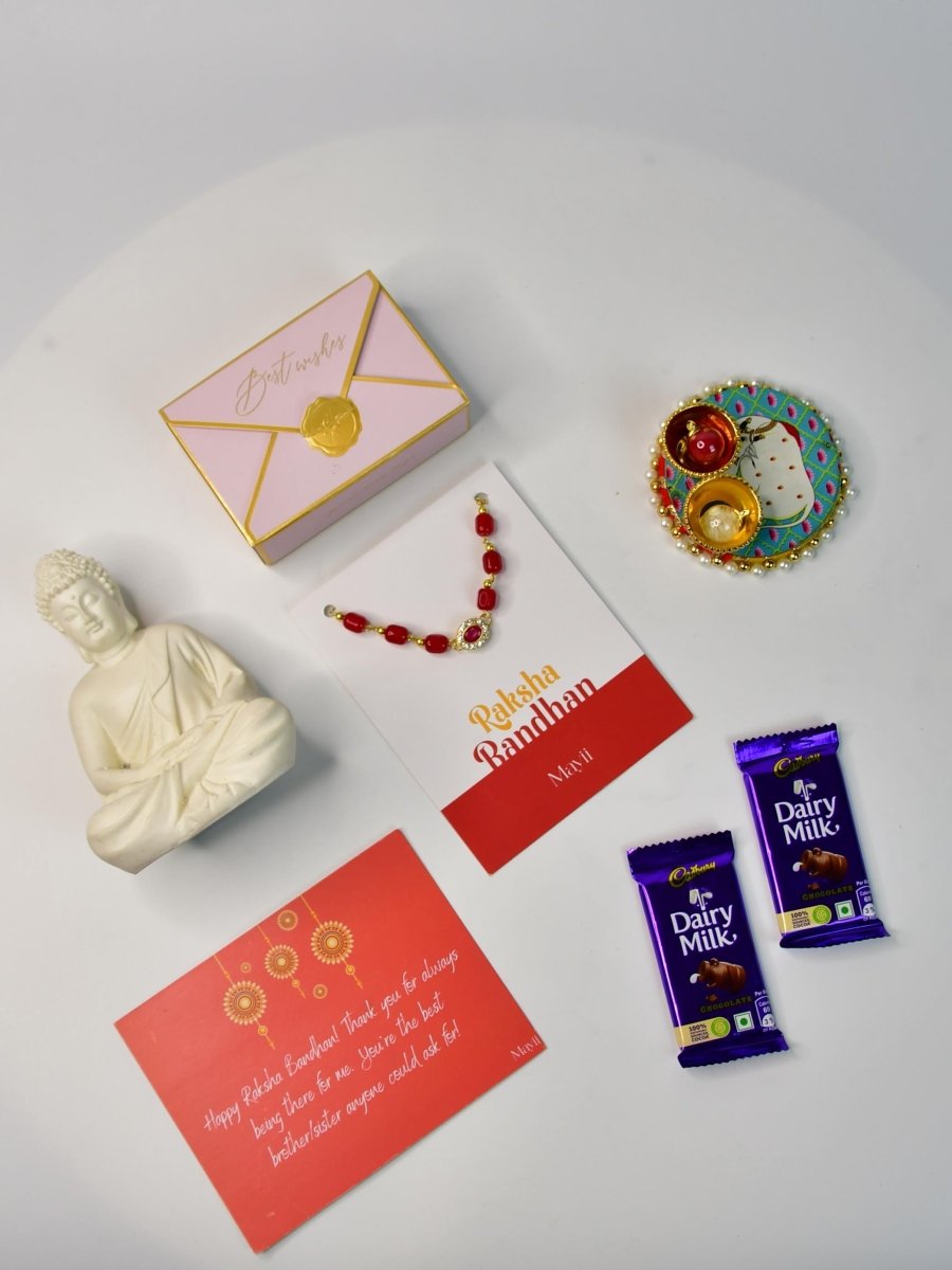 Sowpeace Exquisite Red Beads Rakhi Pack of 1 with Roli Chawal Thali, Chocolates, Buddha and Greeting card combo for Raksha Bandhan and Gifting