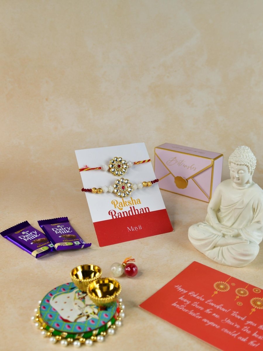 Sowpeace Exquisite Red Centre Flower Rakhi Pack of 1 with Roli Chawal Thali, Chocolates, Buddha and Greeting card combo for Raksha Bandhan and Gifting