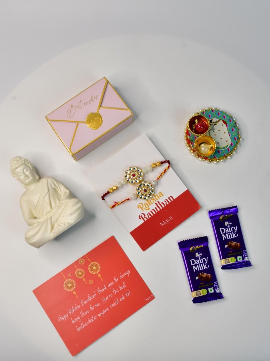 Sowpeace Exquisite Red Centre Flower Rakhi Pack of 1 with Roli Chawal Thali, Chocolates, Buddha and Greeting card combo for Raksha Bandhan and Gifting