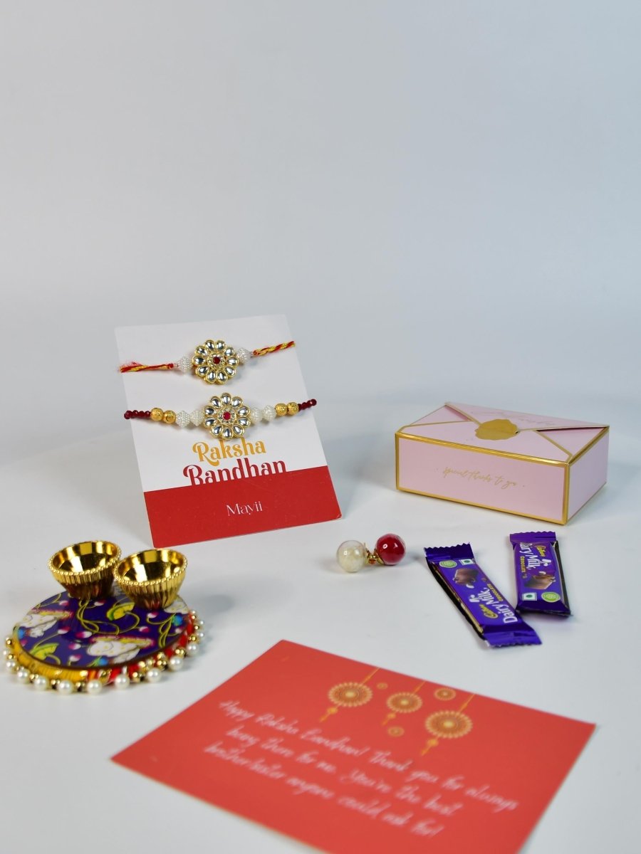 Sowpeace Exquisite Red Centre Flower Rakhi Pack of 1 with Roli Chawal Thali, two Chocolates, and Greeting card combo for Raksha Bandhan and Gifting