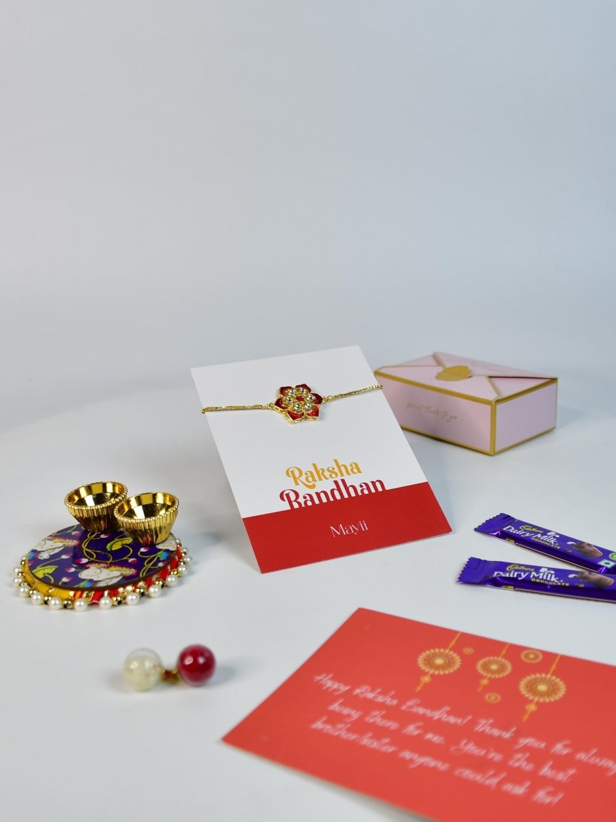 Sowpeace Exquisite Red Flower Rakhi Pack of 1 with Roli Chawal Thali, two Chocolates, and Greeting card combo for Raksha Bandhan and Gifting