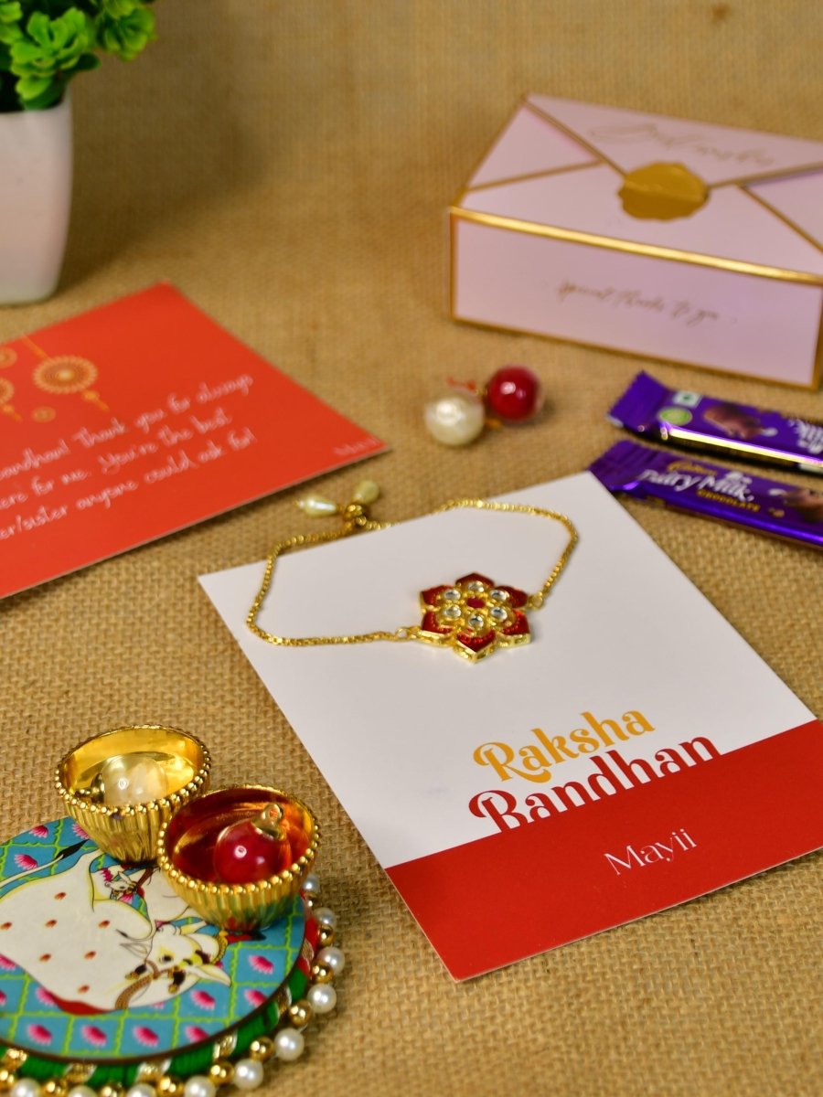 Sowpeace Exquisite Red Flower Rakhi Pack of 1 with Roli Chawal Thali, two Chocolates, and Greeting card combo for Raksha Bandhan and Gifting