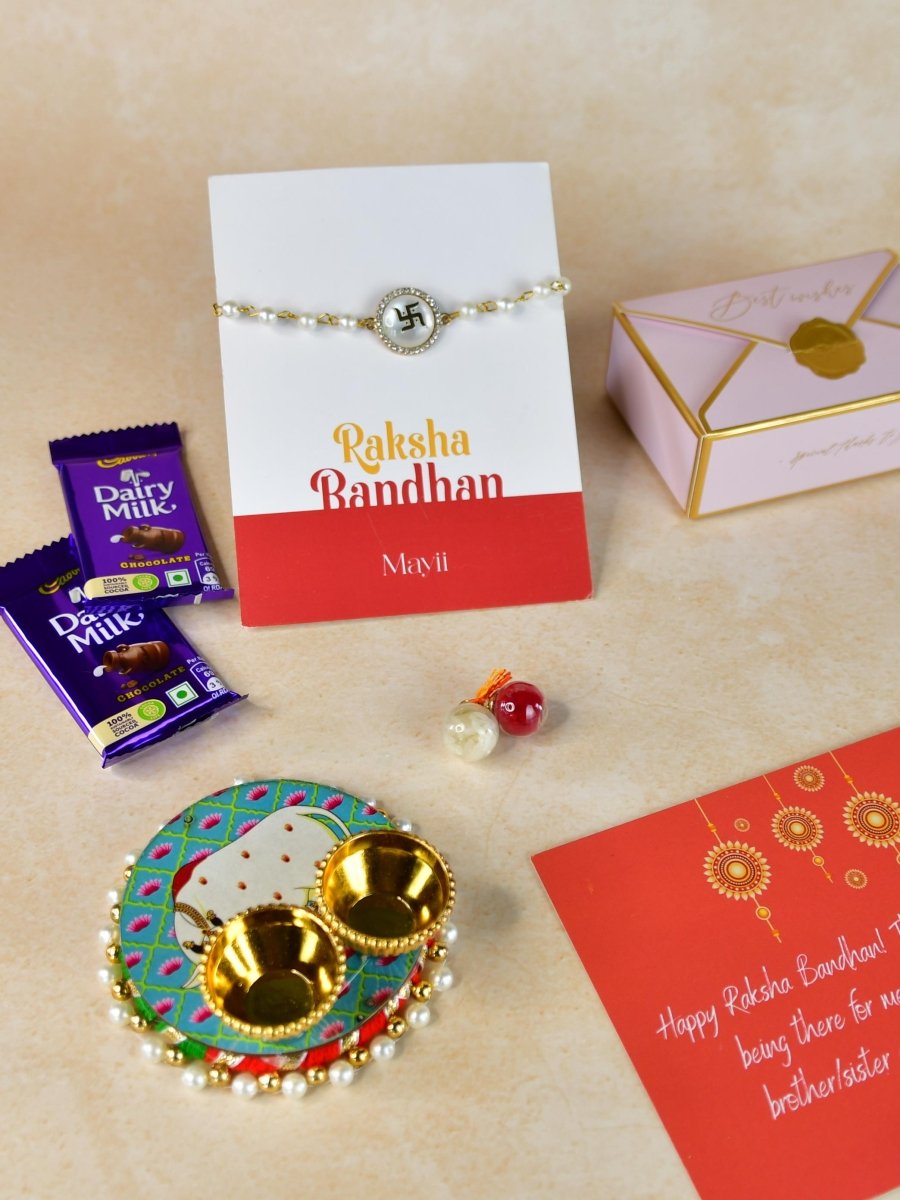 Sowpeace Exquisite Swastik Rakhi Pack of 1 with Roli Chawal Thali, Chocolates, and Greeting card combo for Raksha Bandhan and Gifting