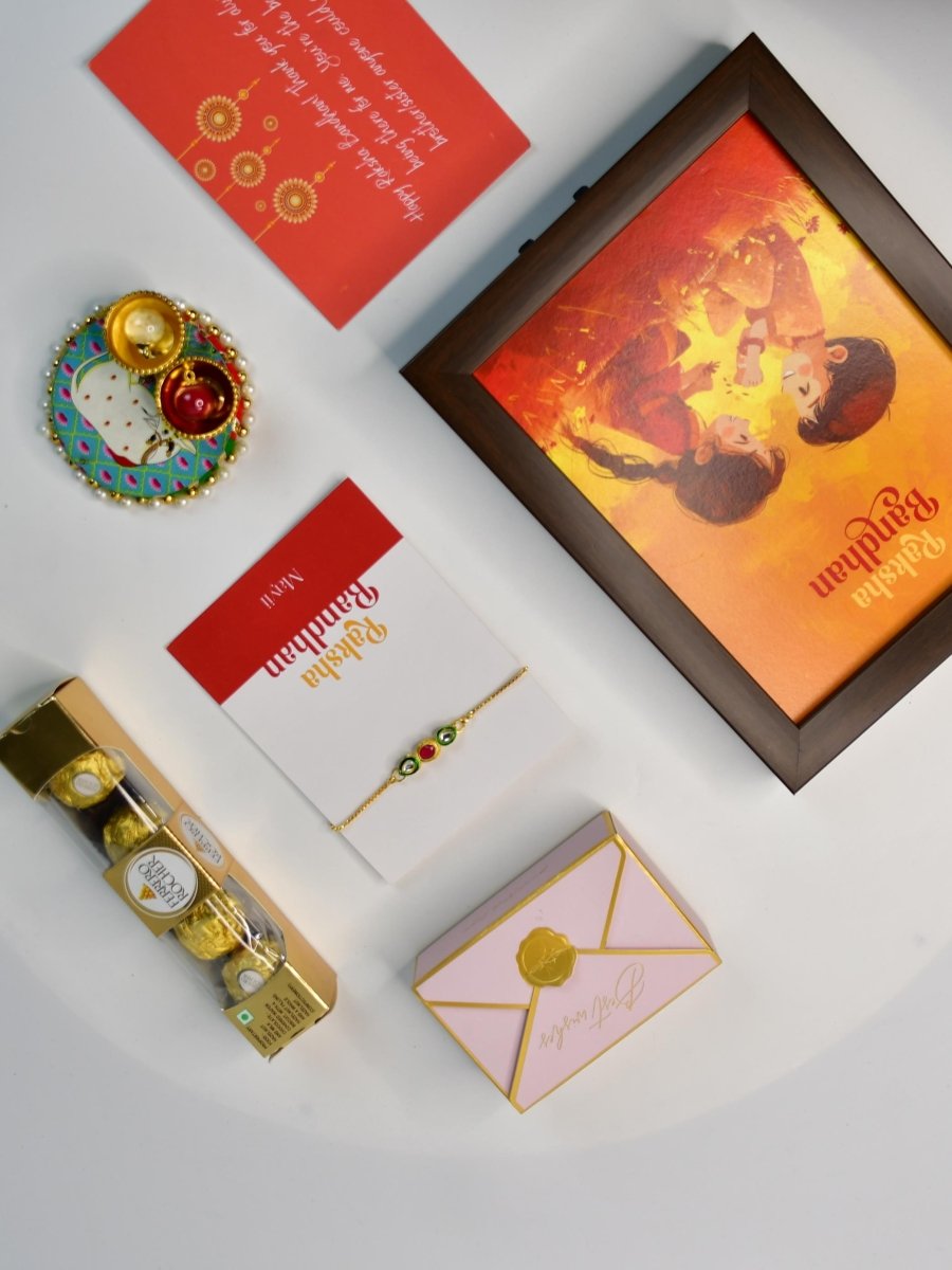 Sowpeace Exquisite Tri Red Green Rakhi Pack of 1 with Roli Chawal Thali, Chocolates, Photo Frame and Greeting card combo for Raksha Bandhan and Gifting