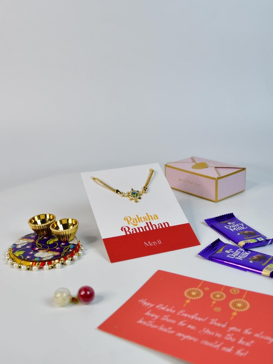 Sowpeace Exquisite Turtle Rakhi Pack of 1 with Roli Chawal Thali, Chocolates, and Greeting card combo for Raksha Bandhan and Gifting