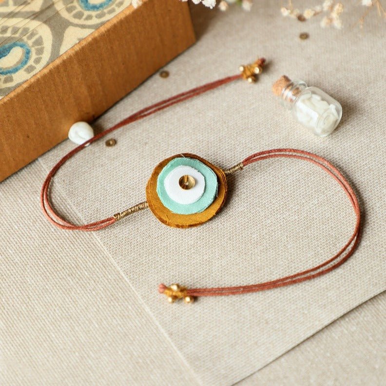 Upcycled Fabric Artisanal Rakhi | Stacked Circles