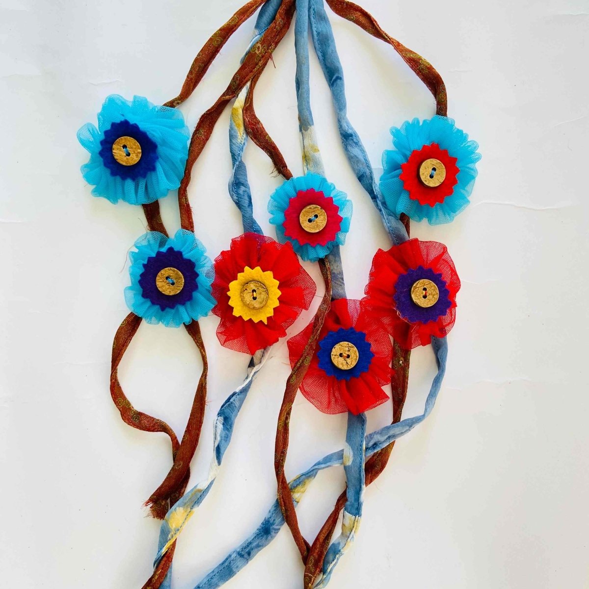 Upcycled Rakhis with Net and Felt Scraps- Coconut buttons